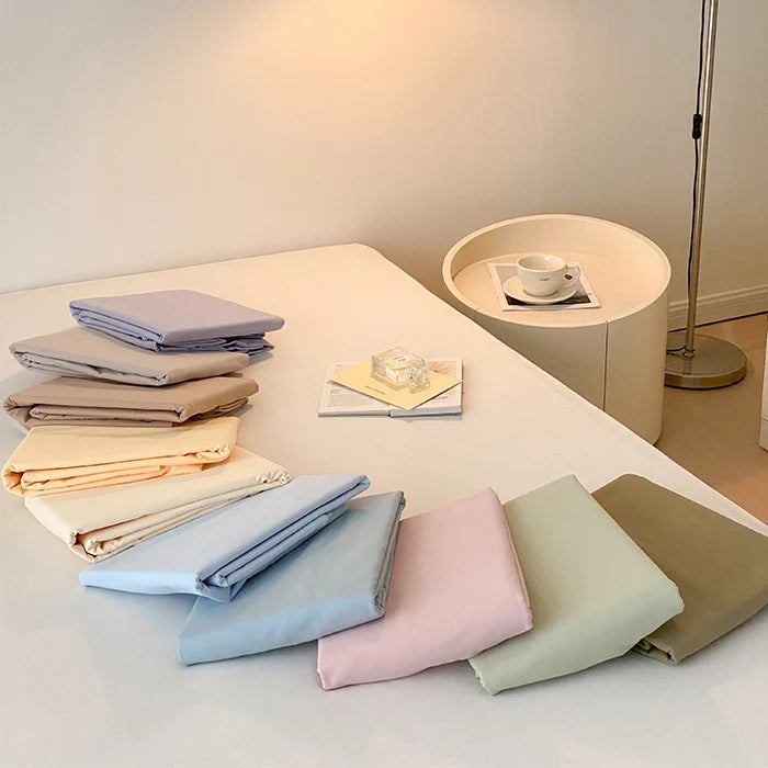 Ensemble de draps pour lit avec retombée supplémentaire et taies réversibles 3