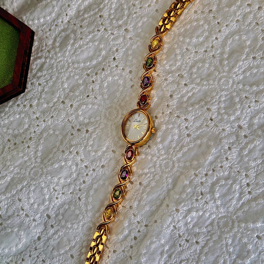 Montre Femme Cadran Ovale avec Pierres Précieuses 5