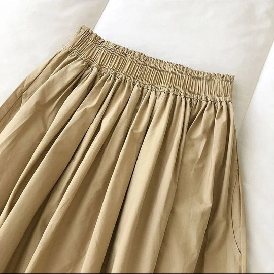 Jupe mi-longue plissée trapèze pour femme