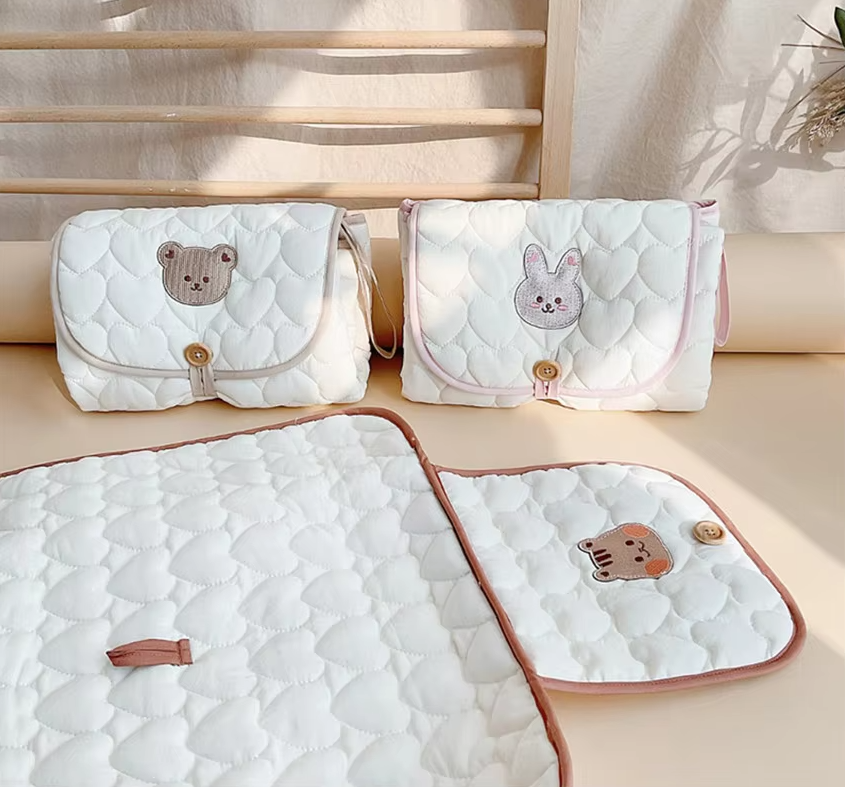 Changeur de couches pliable pour bébé