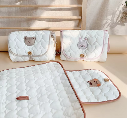 Changeur de couches pliable pour bébé