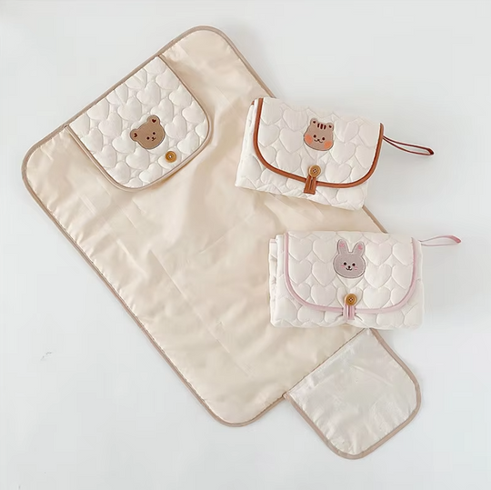 Changeur de couches pliable pour bébé