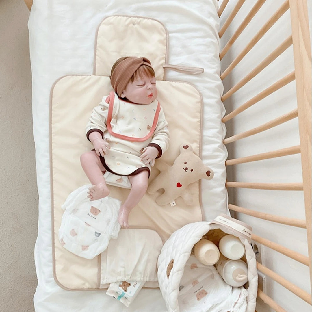 Changeur de couches pliable pour bébé